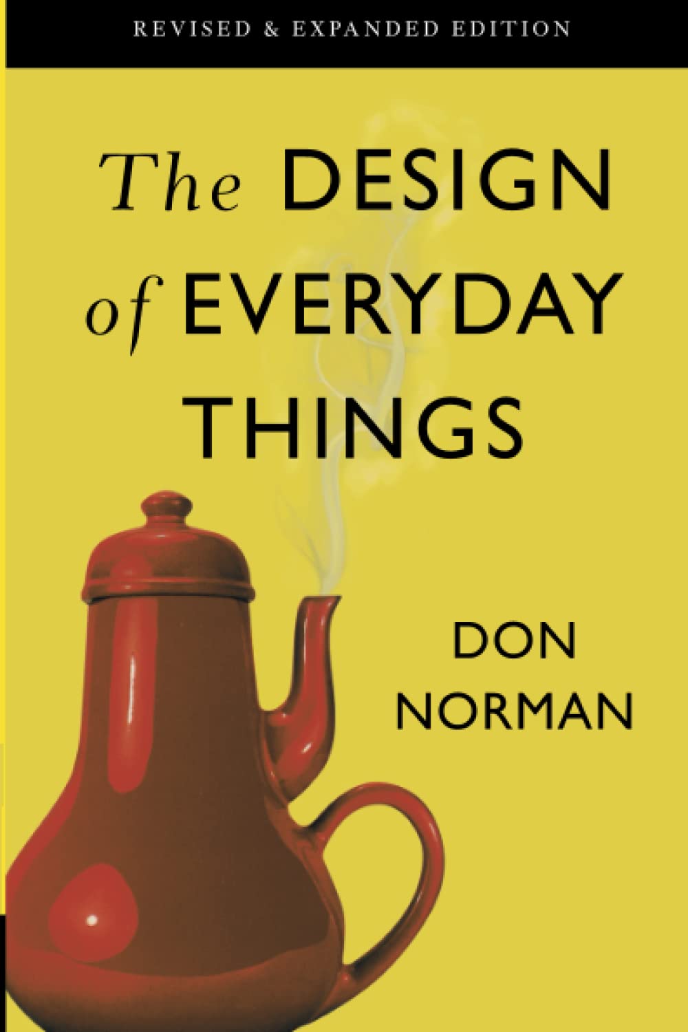 Book cover of The Design of Everyday Things by Don Norman, revised and expanded edition. The cover features a red teapot on a yellow background with steam rising from its spout.