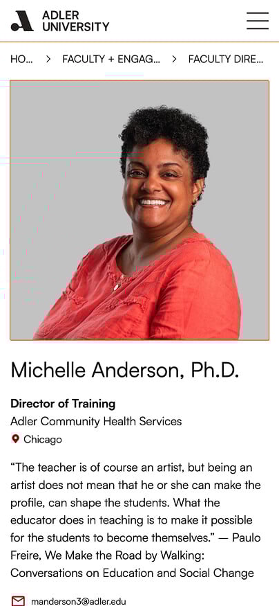 A smiling woman with short curly hair wearing a coral top poses in front of a red background. Text identifies her as Michelle Anderson, Ph.D., Director of Training at Adler University in Chicago and NYU alumna.